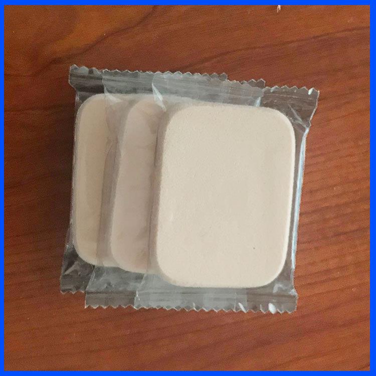 化妆品上海粘粉海绵全自动枕式下走纸包装机