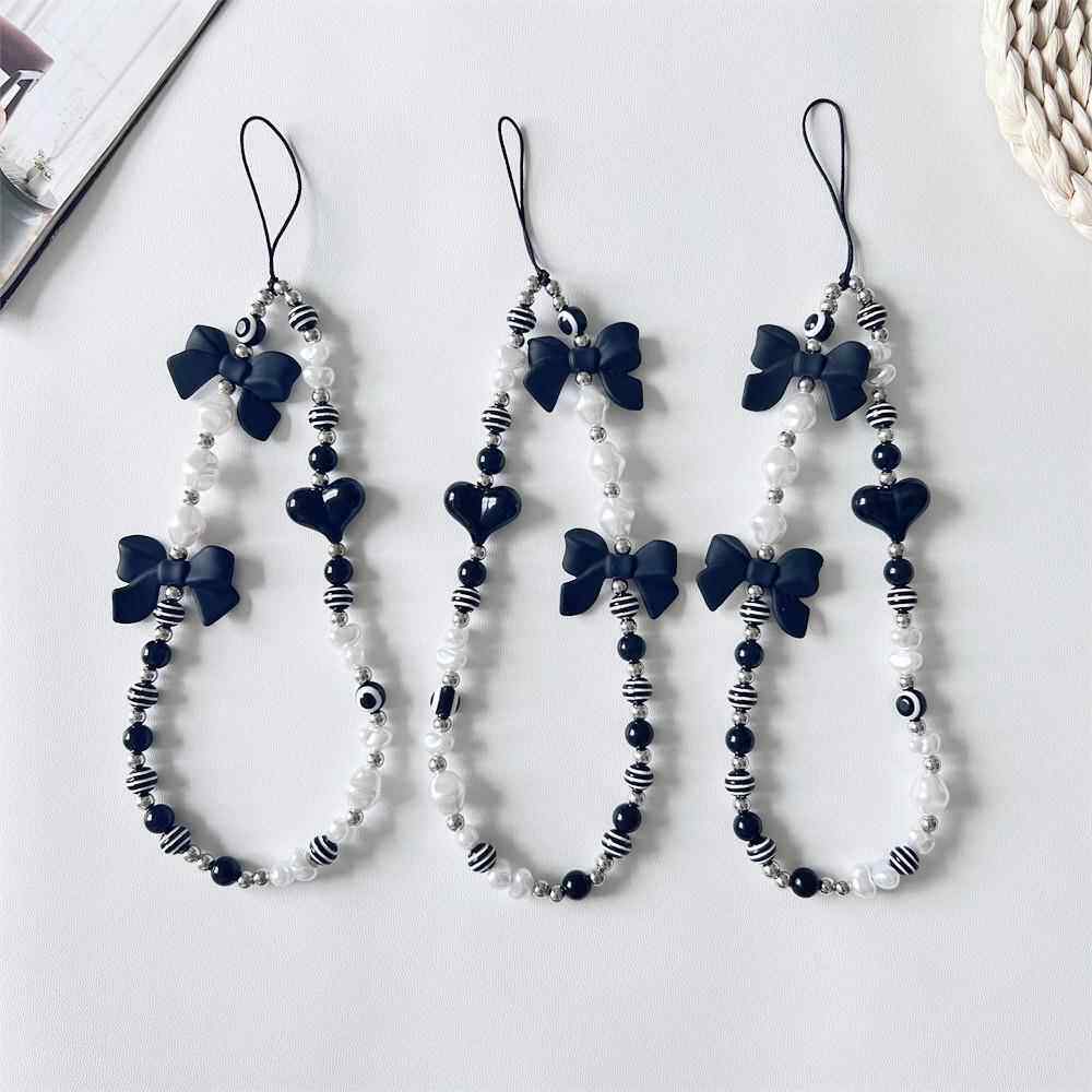 新款手机挂绳女短款创意串珠链挂饰爱心蝴蝶结手机链配件包包装饰