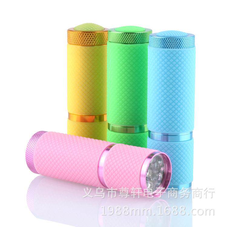 9LED迷你夜光手电筒硅胶皮9led白光日用照明电池款铝合金手握式