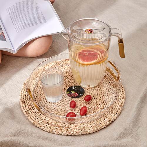 Round tea table with a cool water glass placement tray, a lu