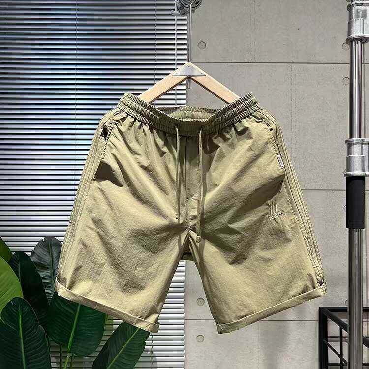 代购香港潮男夏季速干男士沙滩裤休闲纯色五分裤子宽松工装短裤男