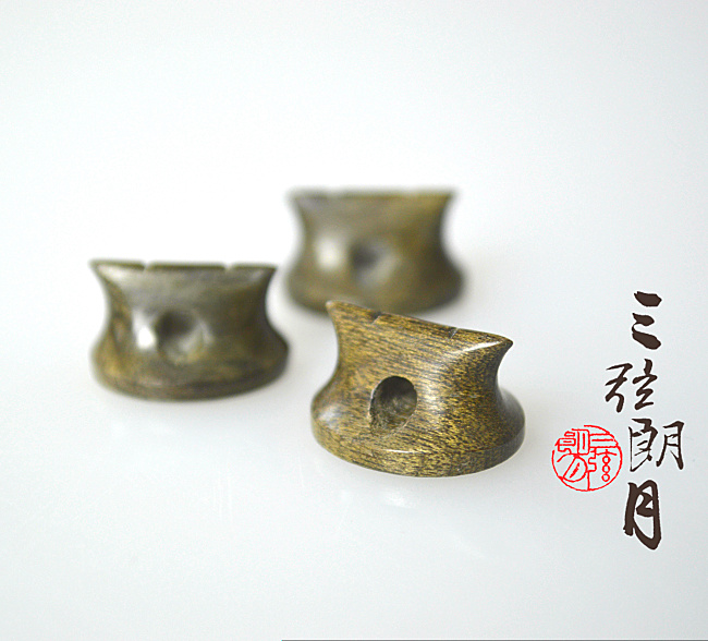 * 千年阴沉木码二胡码 绿料金丝楠木 专业琴码子 腰鼓型