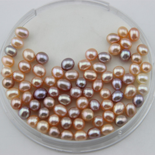 淡水圆润米形，规格为6-6.5MM，6.5-7MM，7-7.5MM，颜色为白，粉，紫三色，默认不打孔，需要打孔请联系客服，打孔之后不退换，请联系客服