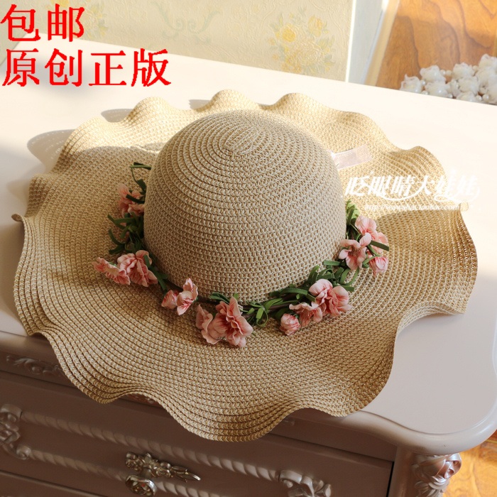 潮女花朵波浪沙滩海边度假草帽