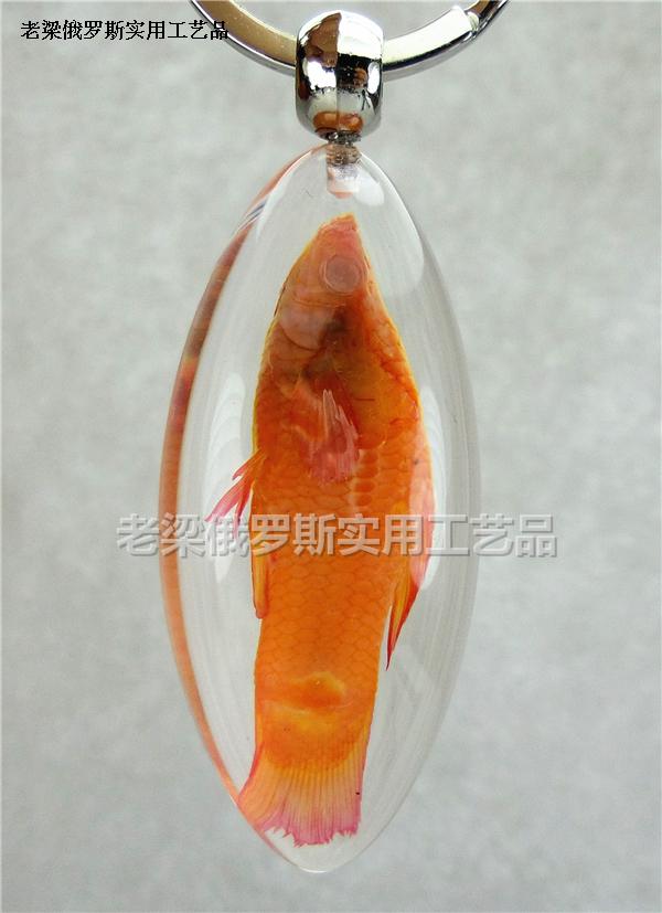 椭圆形寓意年年有余桔红色钥匙扣