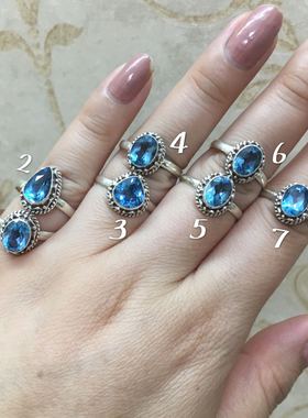 925银精致小巧风托帕石戒指新品