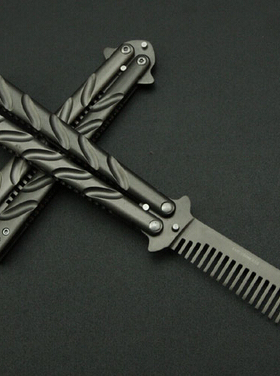 蝴蝶刀 梳子甩刀 新手练习工具折叠练习刀送螺丝工具不开刃 包邮