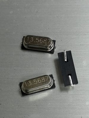 汽车遥控无源贴片晶振  49SMD   13.56875MM  20PF 10PPM  2脚