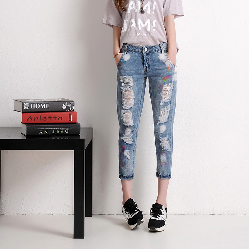 The new seven jeans female loose jeans Ms. Slim was thin and colorful personality hole pattern cross-pants tide