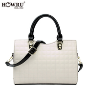 2015 new autumn winter fashion stereotypes rhombic Korean leisure handbag day black and white one-shoulder Messenger bag