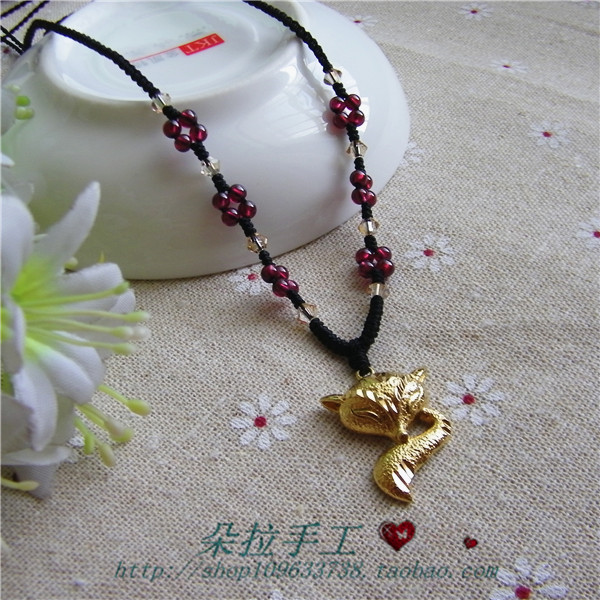天然石榴石黄金手工编制吊坠绳图片