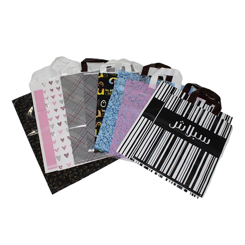 现货外贸包c装袋服装店袋 手提袋格子塑料袋 加厚日用精品通用袋