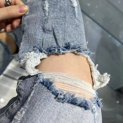 2023春夏季新款乞丐牛仔裤男浅蓝色破洞修身休闲裤水洗设计感裤子