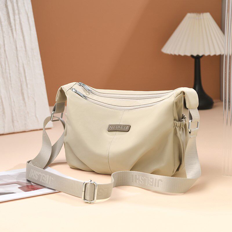 牛津布斜挎包女2024新款包包大容量多隔层轻便单肩小包时尚帆布包