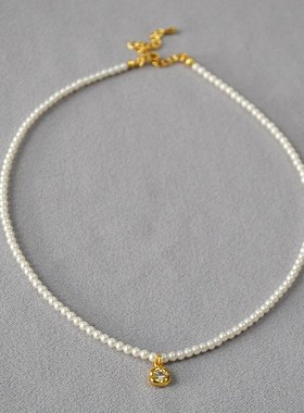 法式优雅小众设j计仿施家珍珠简约细巧不规则锆石花朵吊坠短款项