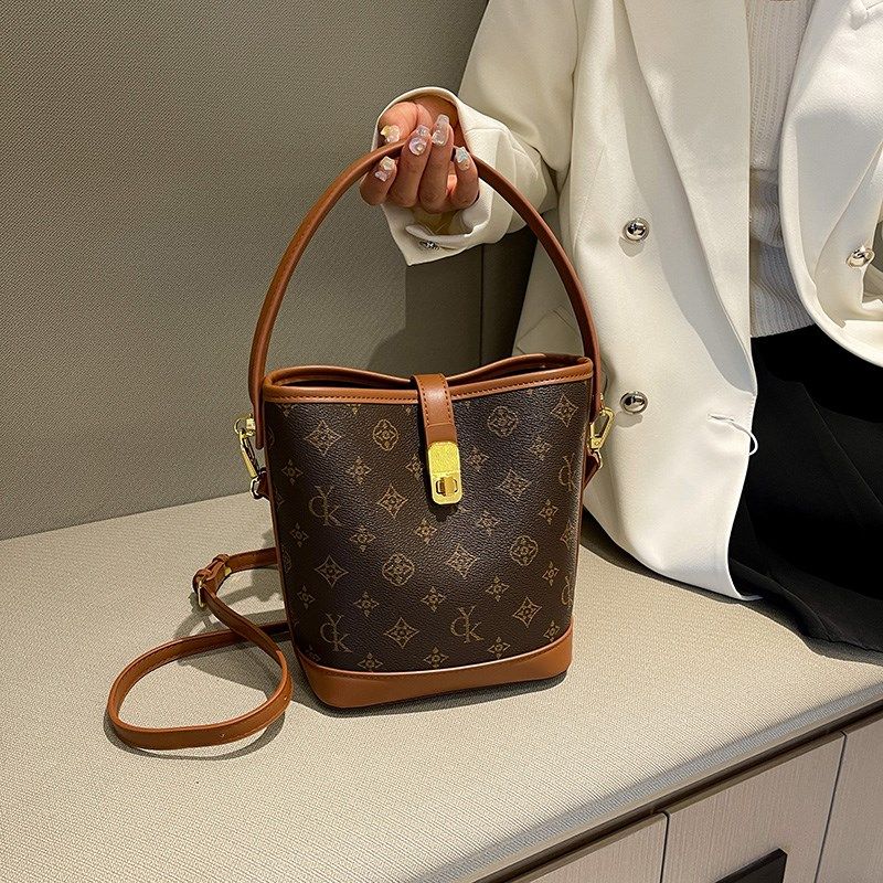 网红爆款水桶包包女式2025夏季新款时尚老花手提包百搭单肩斜挎包,箱包皮具/热销女包/男包,水桶包,淘宝优惠券,粉丝福利购,淘宝优惠卷