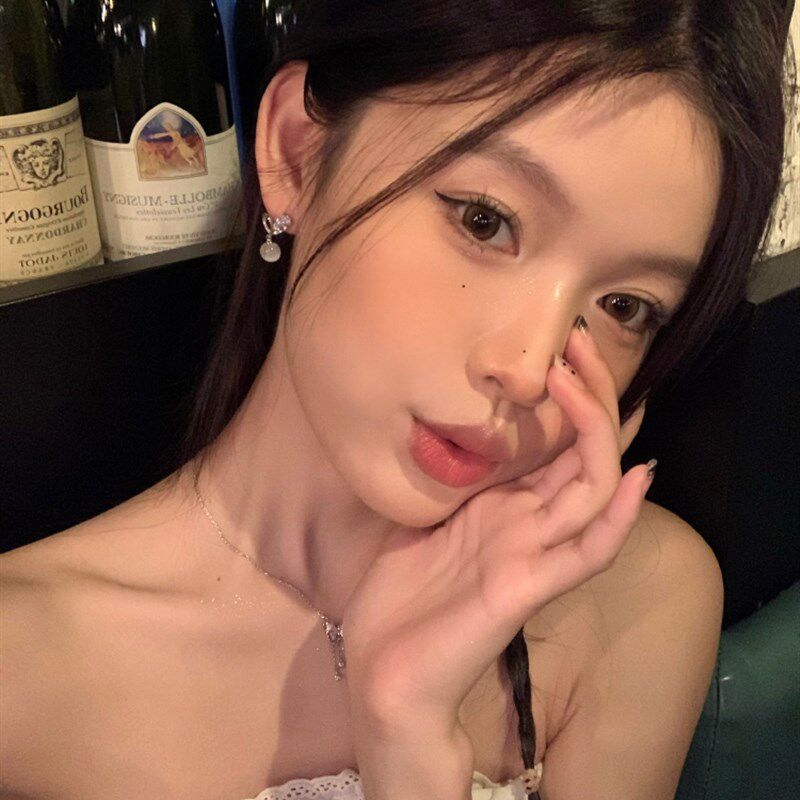 新品猫眼石爱心耳环轻奢小众耳针设计感高级耳饰女无耳洞蚊香盘耳