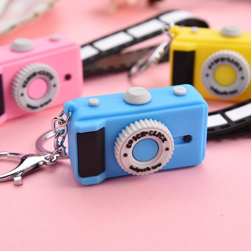 极速10 pcs/lot cute Silicone camera keychain Toy Black and w