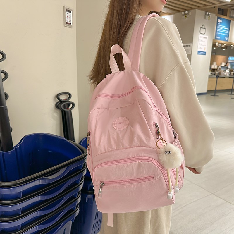 书包女生大学生2024新款简约通勤背包旅游轻便韩版登山户外双肩包