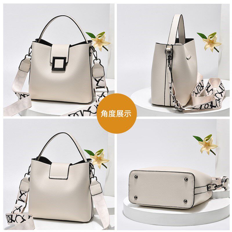 时尚女士小包包夏季新款韩版潮百搭手提宽带水桶包个性单肩斜挎包