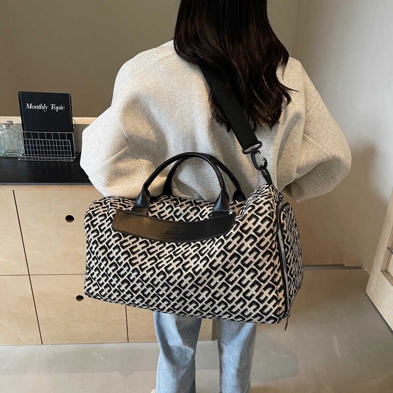 旅行包包女帆布手提包大容量行李包轻便旅游收纳袋待产时尚健身包,箱包皮具/热销女包/男包,旅行袋,淘宝优惠券,粉丝福利购,淘宝优惠卷