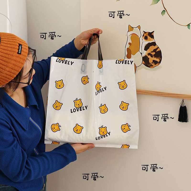 网红服装手提袋卡通印花商场购物礼品袋子服装店时尚塑料手提袋