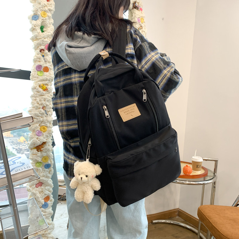 双肩包女2022新款背包简约旅游15.6寸电脑包大容量白色书包大学生