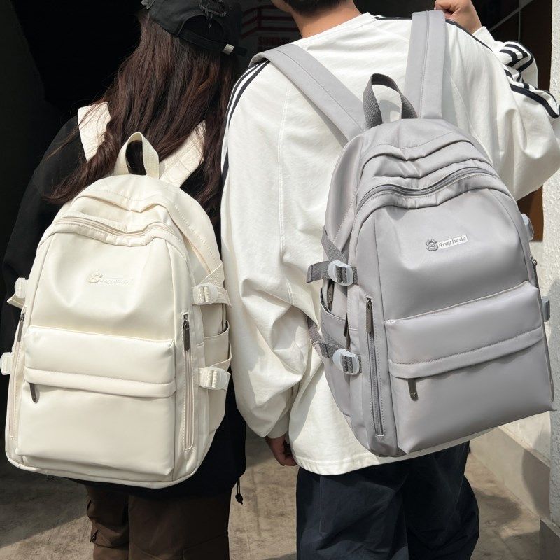 大容量简约休闲旅行双肩包男结实耐用15.6寸电脑背包大学生书包女