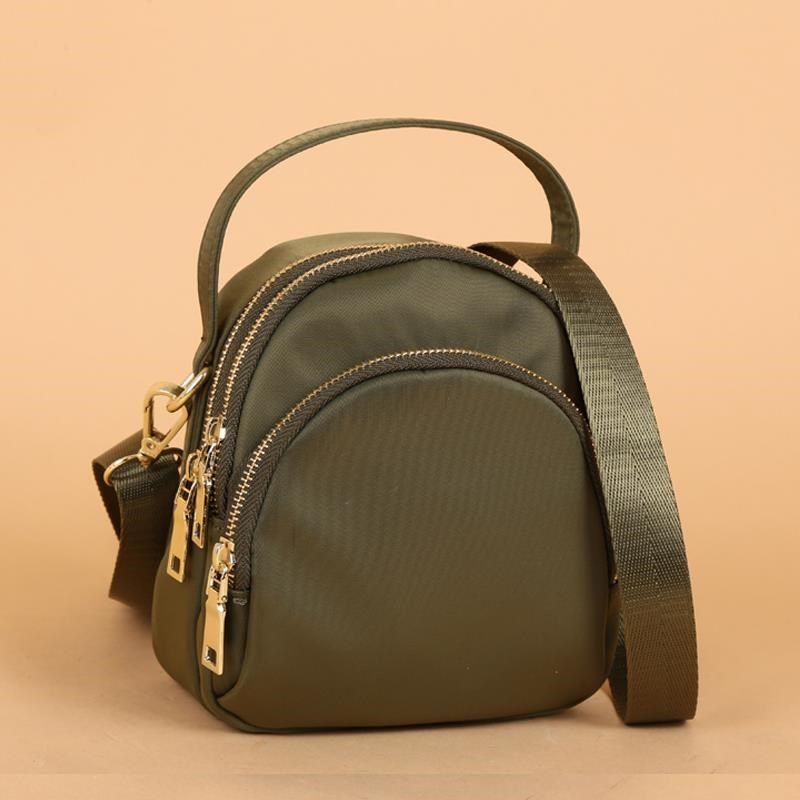 女2024新款轻斜挎包女帆布简约迷你手提中年妈妈小包女牛津布女包