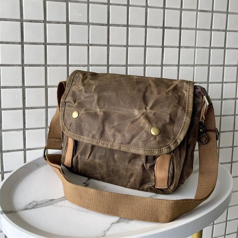美式油蜡帆布做旧简约休闲防水邮差包斜挎单肩户外相机收纳包男女,箱包皮具/热销女包/男包,男士包袋,淘宝优惠券,粉丝福利购,淘宝优惠卷
