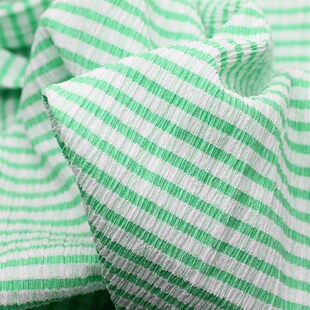 120克炫彩提i花弹力皱布针织时装面料春夏女童装防嗮裙子娃衣布料