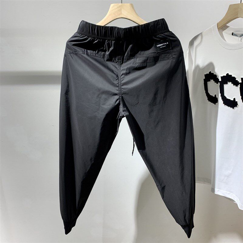 春夏百搭速干透气休闲裤男士u2023年时尚潮牌宽松简约束脚九分裤