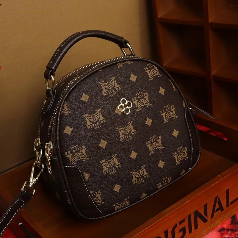 女士包包2025新款潮高级感时尚双拉链宽肩带小圆包手提单肩斜挎包