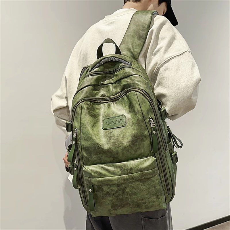 2025新款皮面中学生书包防水双肩包男女生通勤百搭大学生电脑背包