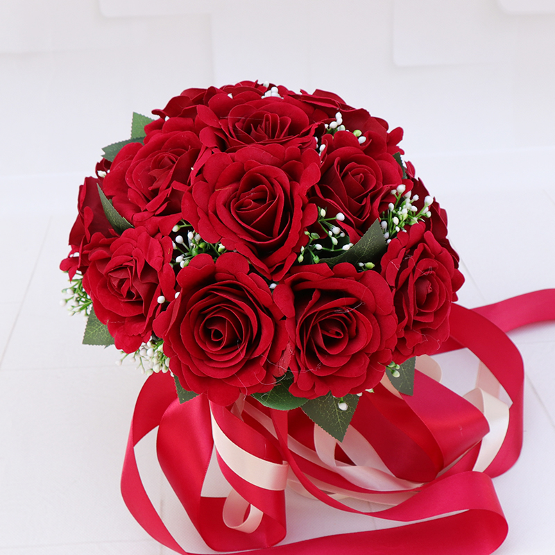 新娘手捧花结婚缎带手捧红花束婚纱照相馆摄影拍照婚礼手捧玫瑰花