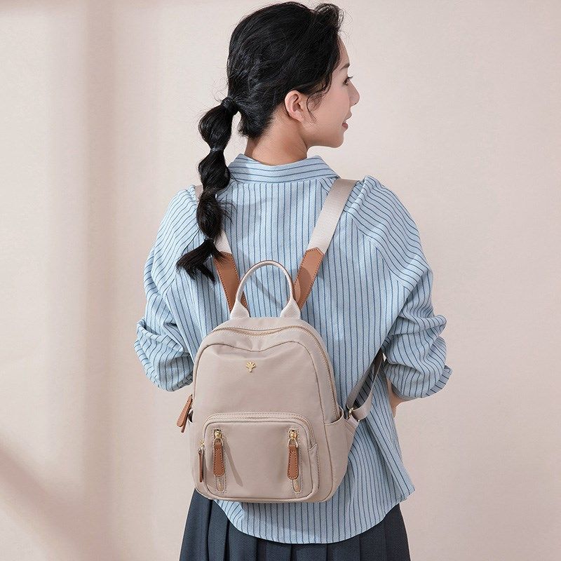 迷你双肩包女洋气上班通勤新款牛津布轻便小背包防盗旅行学生书包