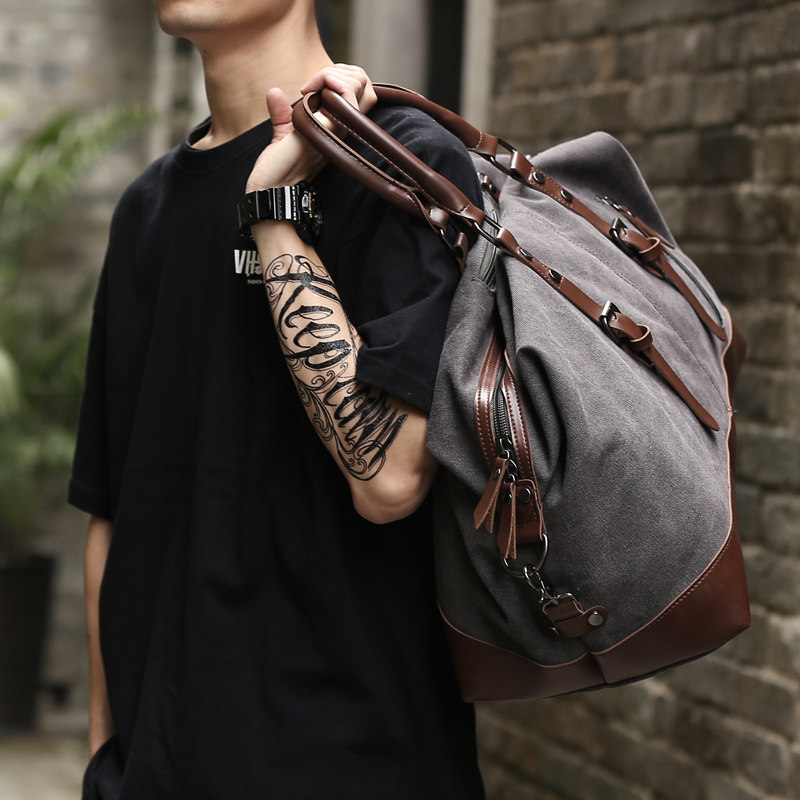 休闲帆布旅行包男士大容量时尚皮质手提行李袋短途出差旅游斜挎包