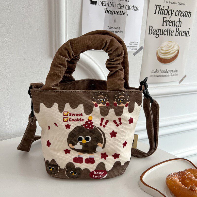 韩版可爱软萌手提斜挎包高颜值水桶单肩包女学生外出包饭小包新款