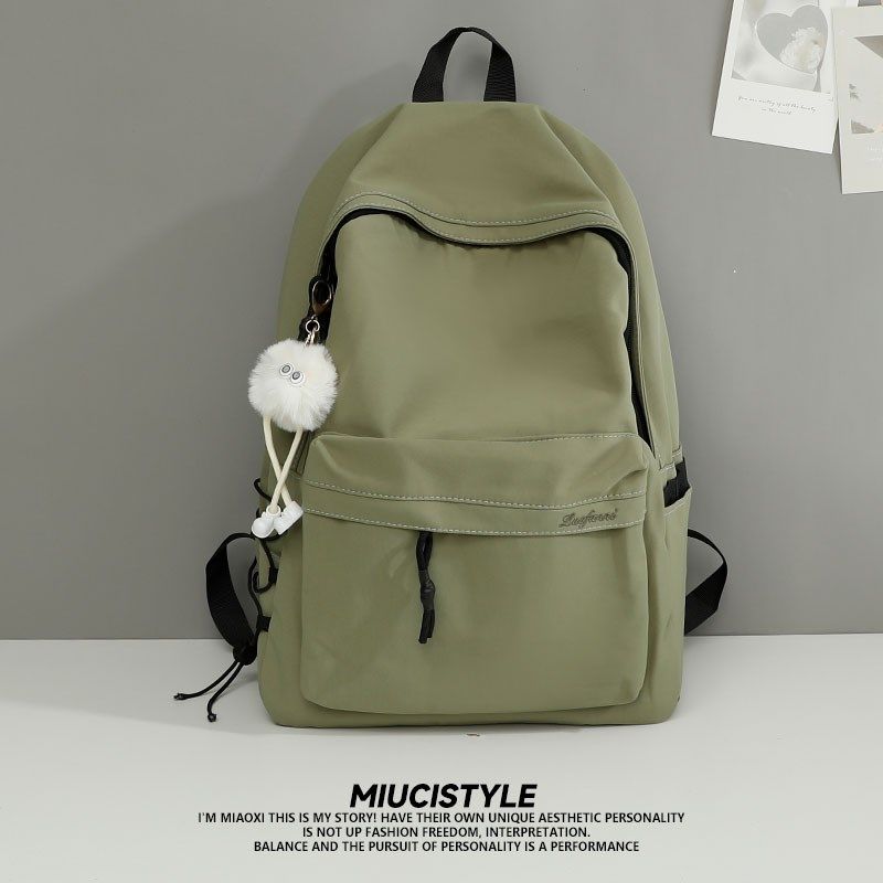 书包女大学生简约百搭大容量旅行防水电脑背包男高中生双肩包新款