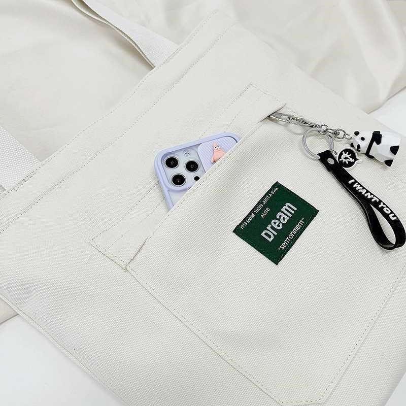 帆布包女单肩斜挎2022新款手提袋装书大容量学生上课简约百搭文艺