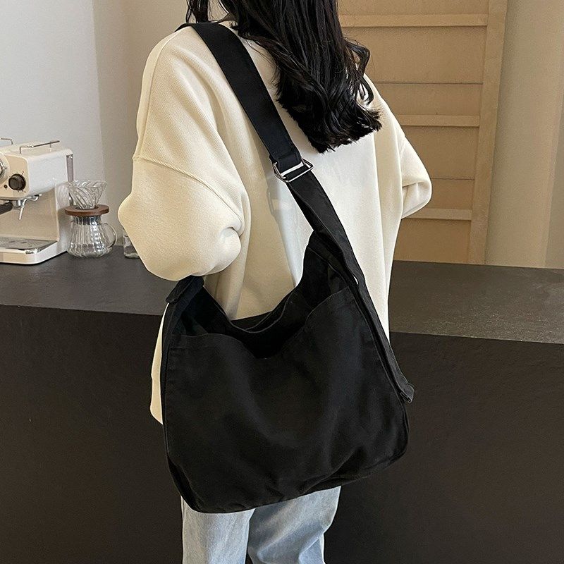 纯色帆布包女休闲大容量斜挎包男女简约时尚学生上课邮差包韩新款,箱包皮具/热销女包/男包,时尚帆布包,淘宝优惠券,粉丝福利购,淘宝优惠卷