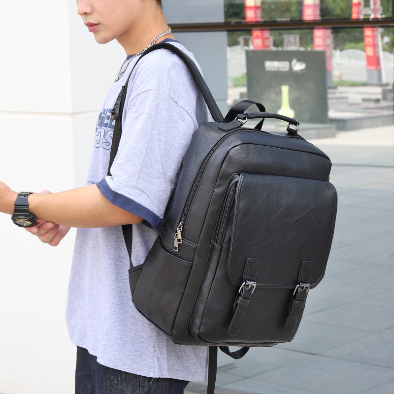 新款男士背包学生书包潮流休闲PU皮大容量电脑包双肩包出差旅行包