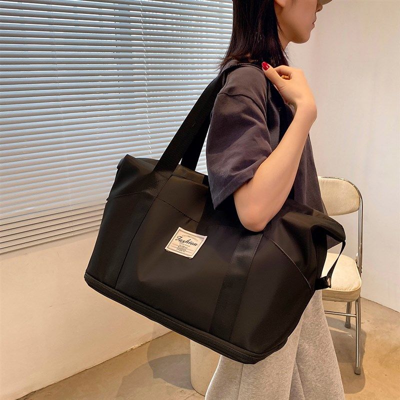 黑色旅行包可套拉杆箱的大容量旅游包女轻便短途手提行李包收纳袋,箱包皮具/热销女包/男包,旅行袋,淘宝优惠券,粉丝福利购,淘宝优惠卷