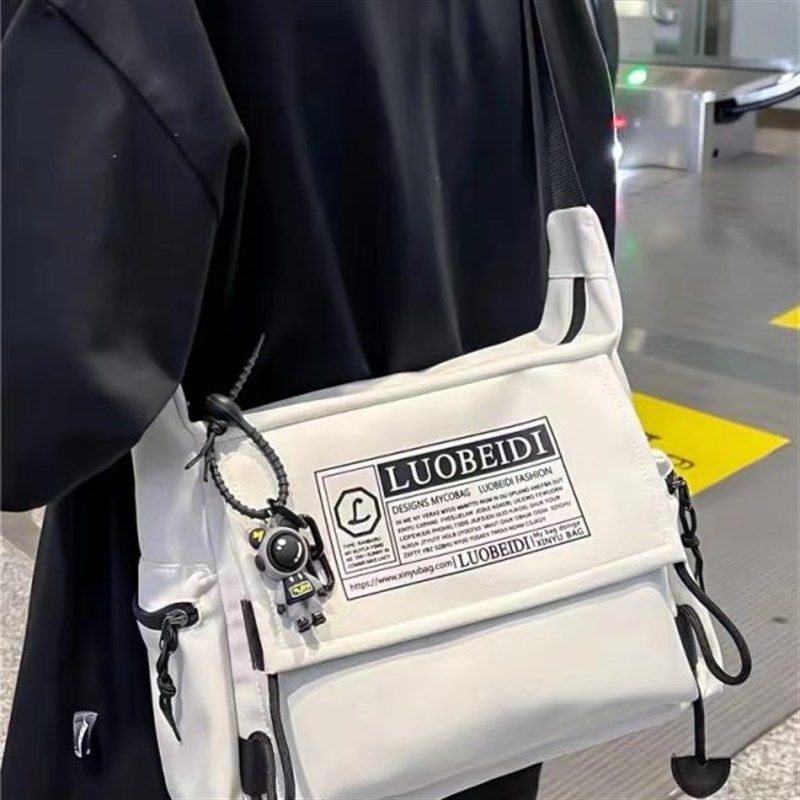 日系帆布包斜挎包男士大容量休闲工装邮差包女学生上课单肩包潮流