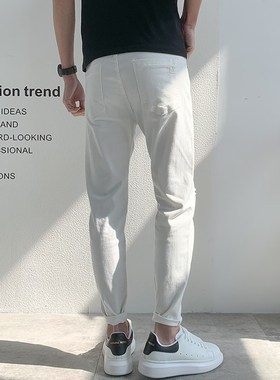 小码高街白色牛仔裤男修r身锥形裤26码27码瘦人薄款工装破洞九分