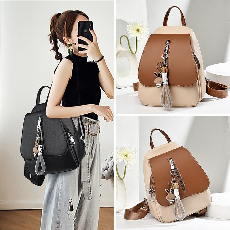 软皮质双肩包女百搭撞色时尚大学生书包小众通勤旅游旅行户外背包