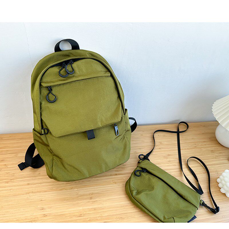 户外山系轻便双肩包女斜挎大容量登山休闲学生书包旅行背包