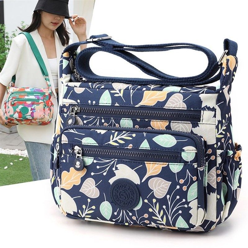 轻便印花多层斜挎包女士单肩布包女休闲帆布大容量妈妈防水背包新