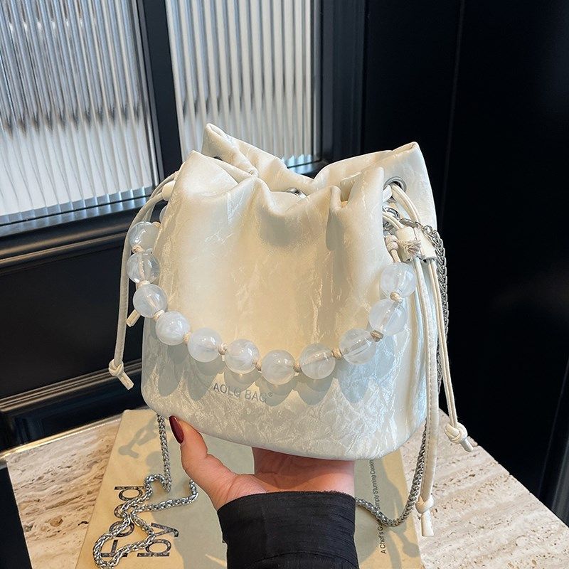 夏天流行爆款小包包女2024新款时尚百搭链条单肩斜挎包超火水桶包,箱包皮具/热销女包/男包,水桶包,淘宝优惠券,粉丝福利购,淘宝优惠卷