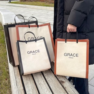 竖版无纺布高档服装店手提袋大号装衣服袋子外出时尚购物袋定制